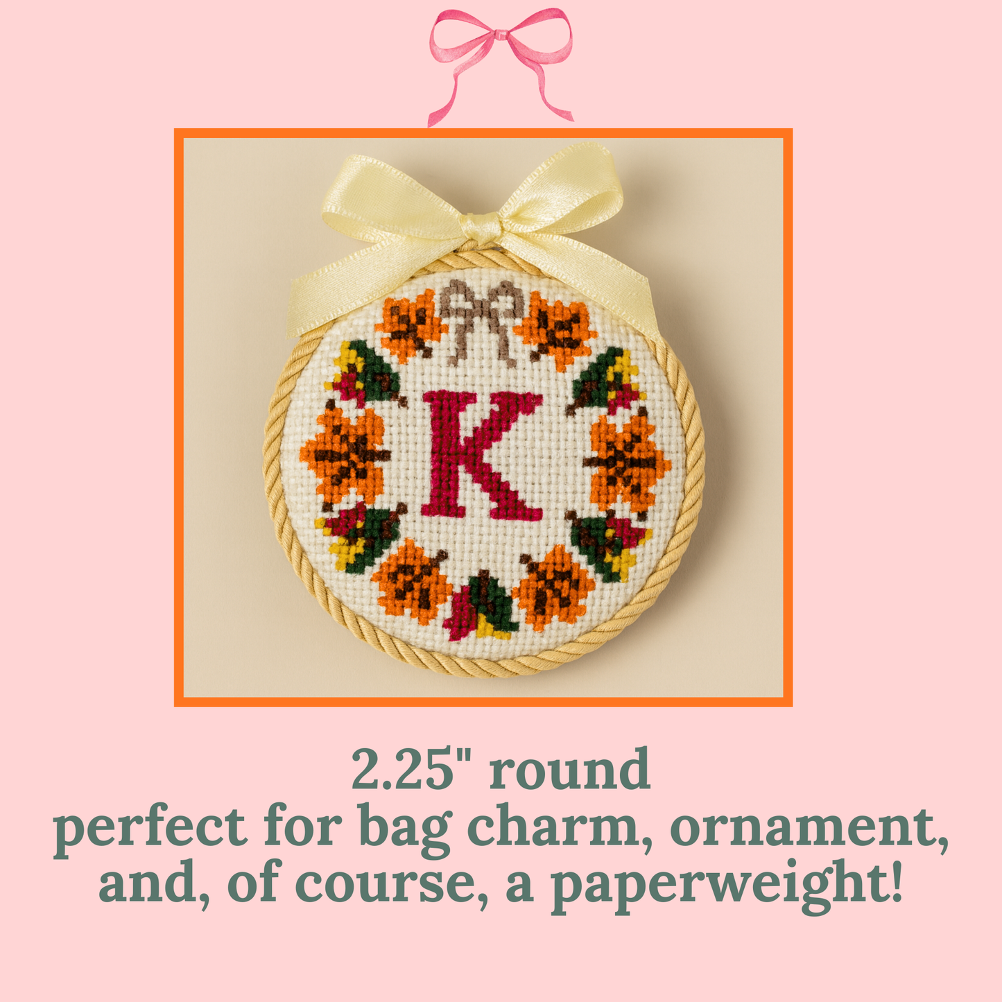 hand painted fall-themed needlepoint wreath canvas with single-letter monogram finished as ornament