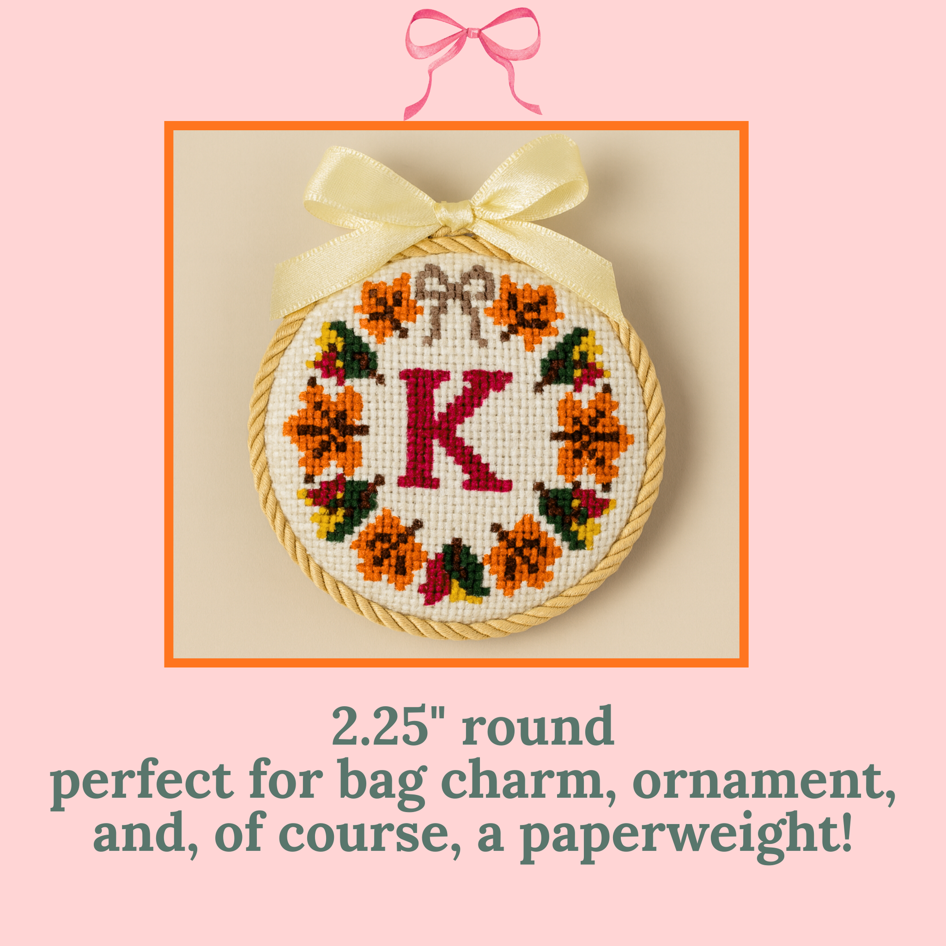 hand painted fall-themed needlepoint wreath canvas with single-letter monogram finished as ornament