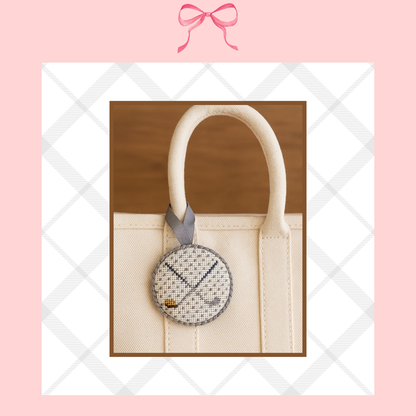 Needlepoint bag charm of a golf ball with golf clubs